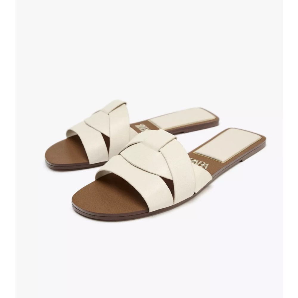 Flat crossed leather sandals